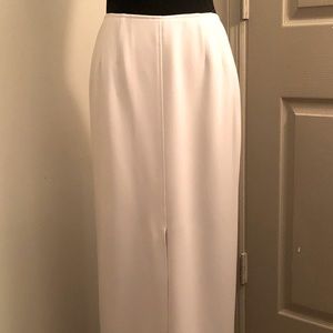 Elegant long skirt, fully lined, zipper back, slit in front. Maxi length.